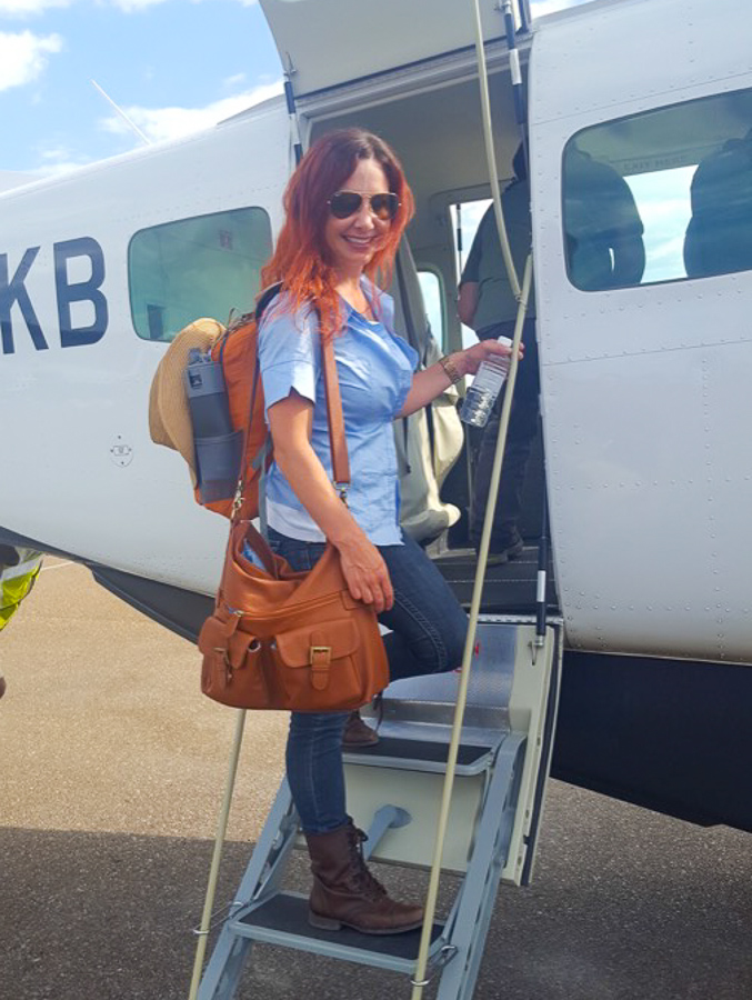 Women entering small safari plane for Africa Safari in Botswana