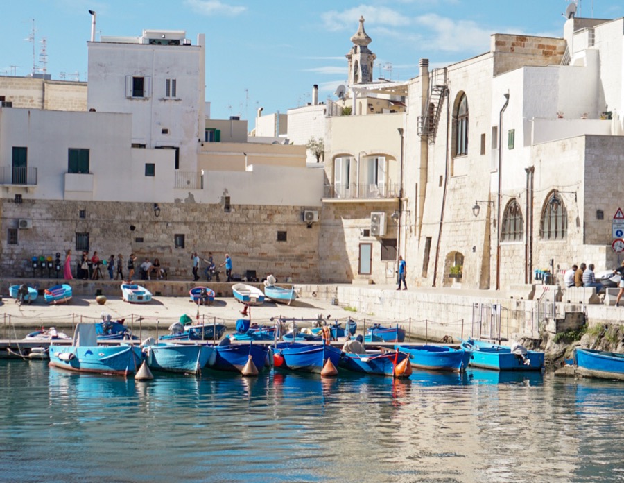 Traditional Blue Boats in the harbor in Monopoli Italy