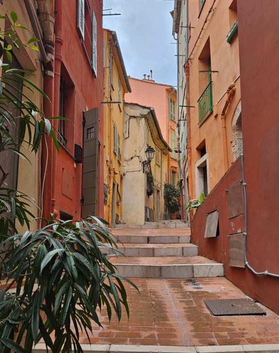 Pretty Colorful street with red and orange colors in Menton